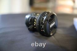 Nikon PC-Nikkor 28mm f/3.5 tilt-shift lens with lens hood