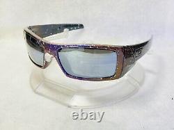 Lunettes de soleil Oakley Gascan personnalisées à verres polarisés noirs avec éclaboussures multicolores.