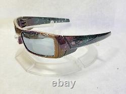 Lunettes de soleil Oakley Gascan personnalisées à verres polarisés noirs avec éclaboussures multicolores.